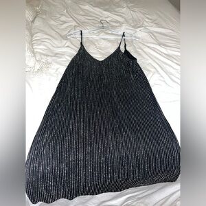 Mini Black Dress. Loose fit with silver metalic threading
